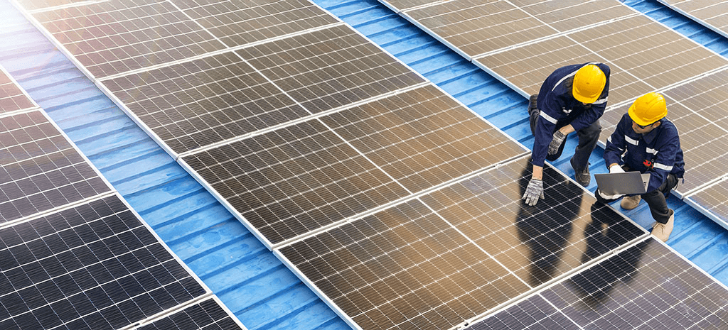 Solar panels with engineers